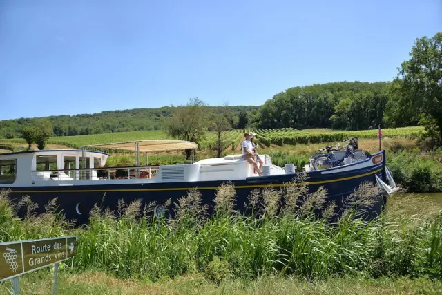 Aussie travellers are swapping city-hopping for slow barge cruises through Burgundy