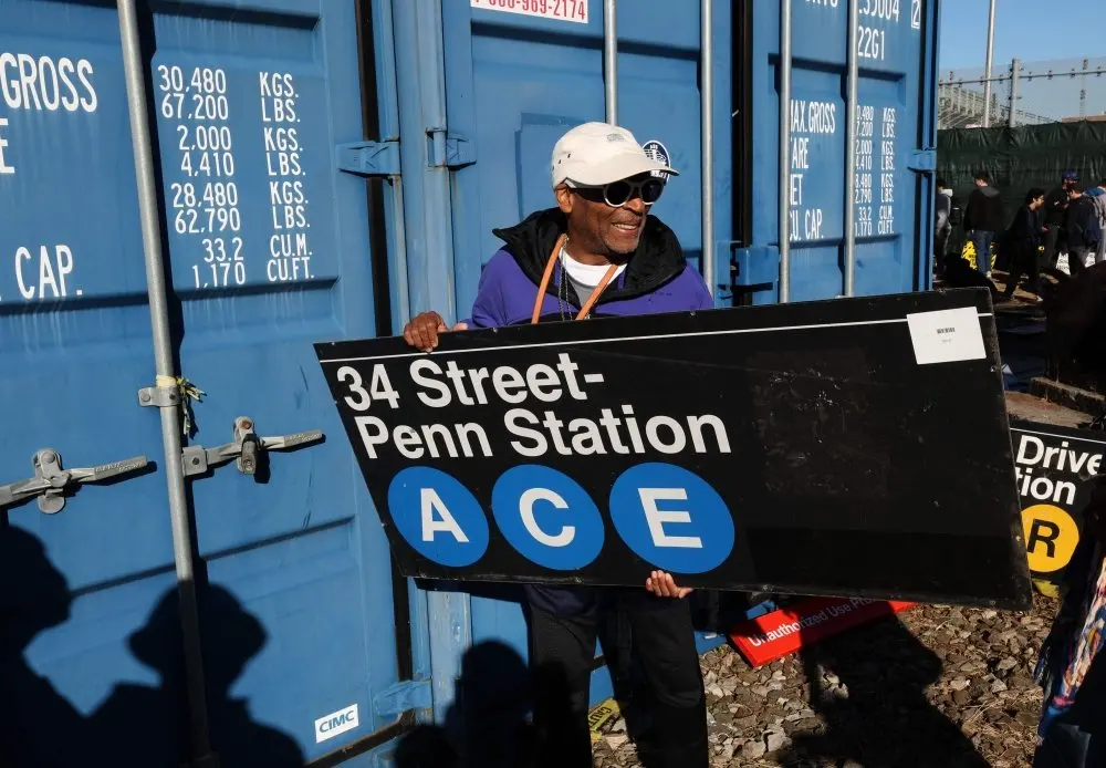 Spike Lee joined 4,000 shoppers hunting retired subway signs at New York's MTA garage sale