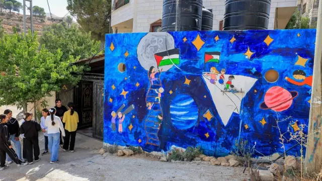 In a divided Hebron neighbourhood, 600 children paint their way past the checkpoints