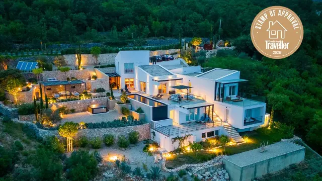 A hillside villa above Croatia's Kvarner Gulf, where griffon vultures drift past the infinity views