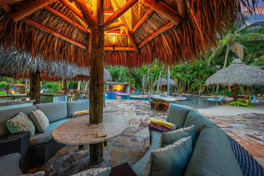 Florida's Best Tiki-Themed Airbnbs, From Swim-Up Bars to a Floating Bungalow